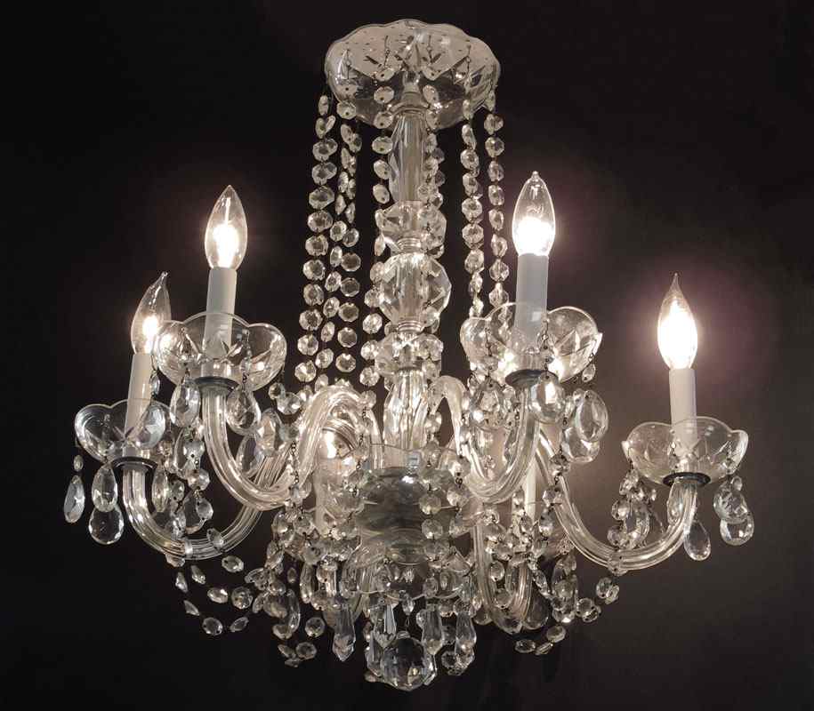 Appraisal: PETITE LIGHT CRYSTAL CHANDELIER Measured '' x ''