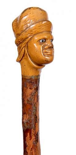 Appraisal: Gentleman Folk-Art Cane Gentleman Folk-Art Cane Ca A carved portrait