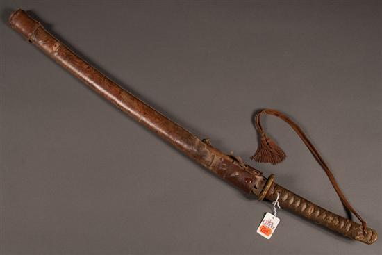 Appraisal: Japanese sword in WWII-era military mounts the markings obscured the