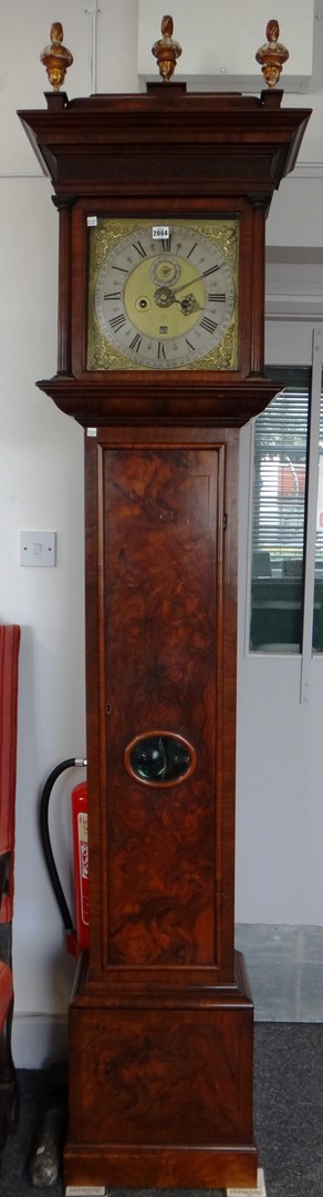 Appraisal: An early th century and later figured walnut eight day