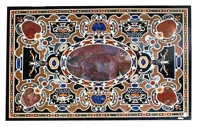 Appraisal: A MOSAIC MARBLE TABLE TOP inset a polychrome specimen and