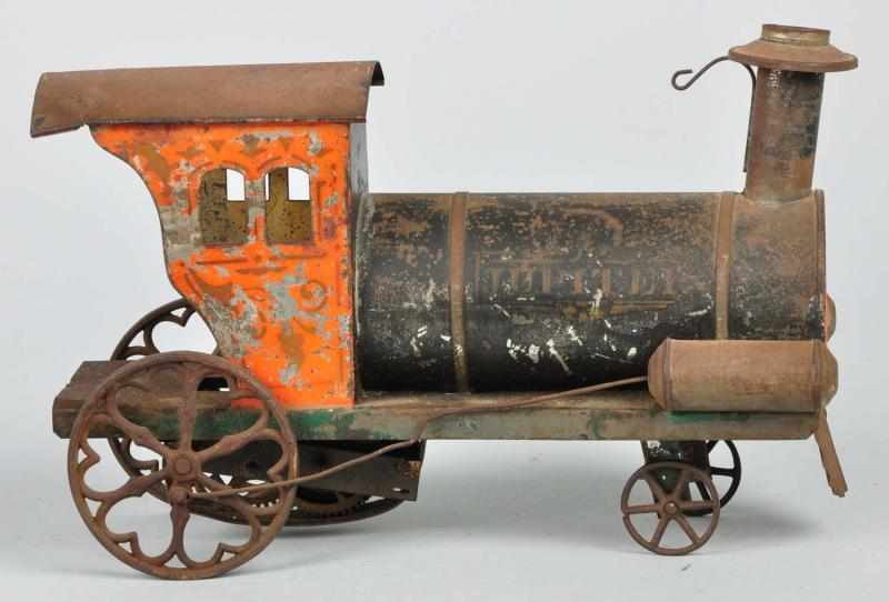 Appraisal: Early American Tin Flyer Train Locomotive Description Clockwork Needs to