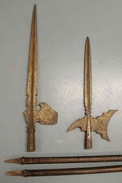 Appraisal: Two wrought iron halberds with wood poles as found largest