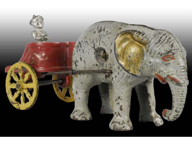 Appraisal: Cast Iron Small Elephant with Chariot Still Bank Description Made