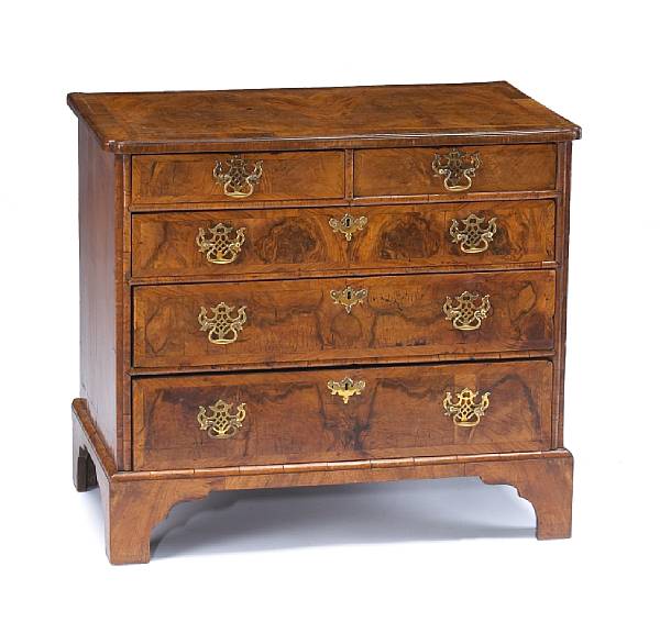 Appraisal: A small George I walnut chest of drawersfirst quarter th