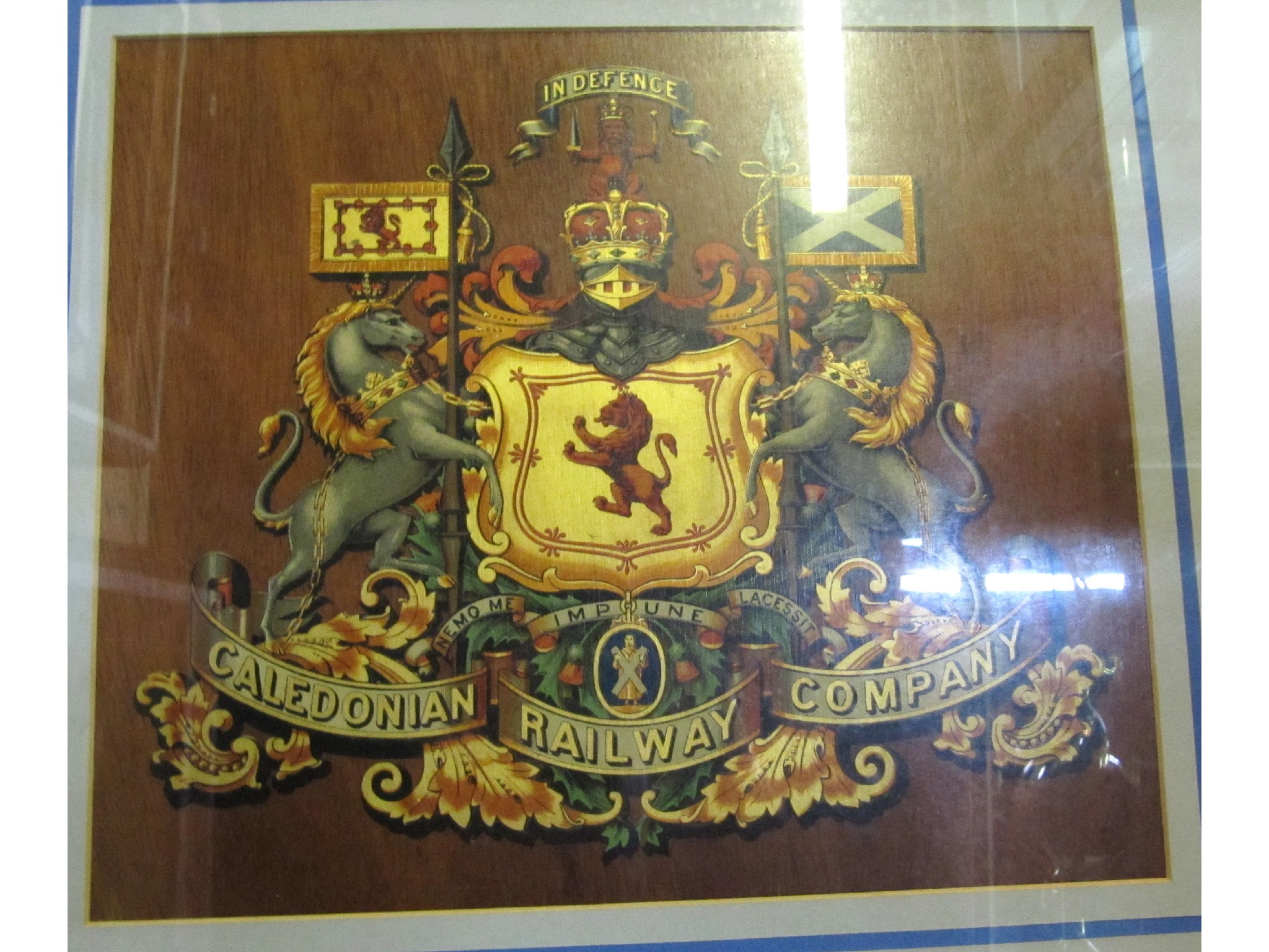 Appraisal: A framed railway crest 'Caledonian Railway Co '