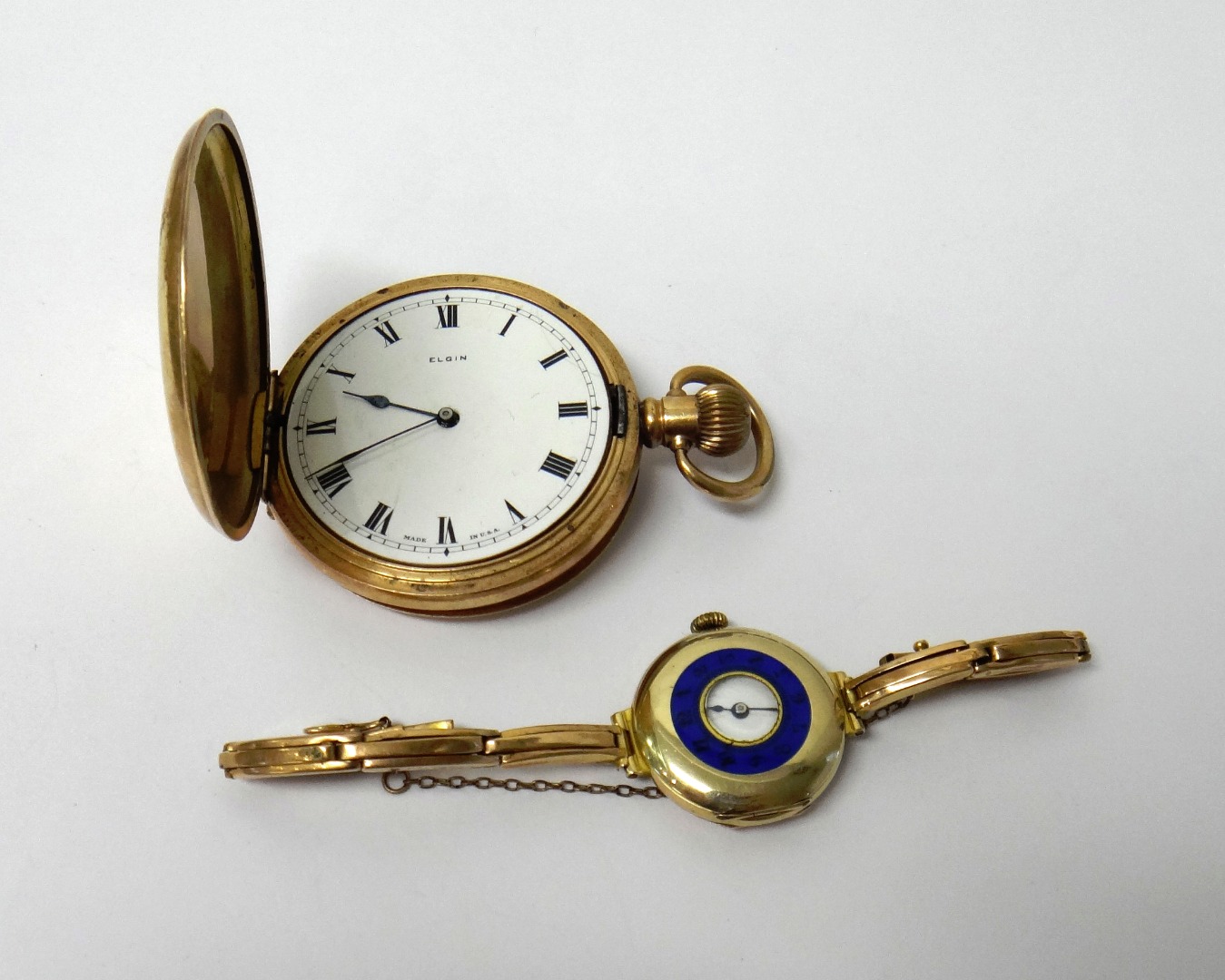 Appraisal: A lady's ct gold circular half hunting cased wristwatch with