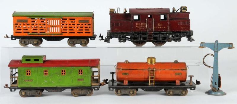 Appraisal: Standard Gauge Train Engine Freight Cars Description This is not