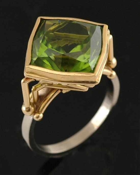 Appraisal: A peridot dress ring Phill Mason The mixed cut peridot