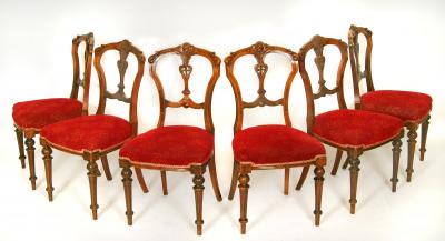 Appraisal: A SET OF SIX VICTORIAN WALNUT DINING CHAIRS upholstered in