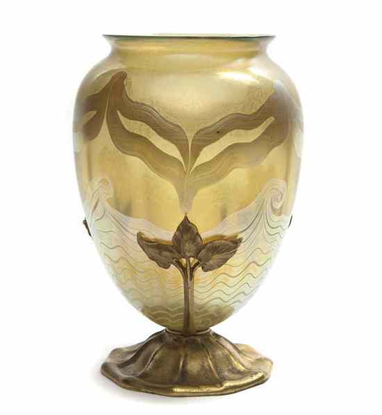 Appraisal: A Tiffany Studios Favrile Glass and Gilt Bronze Mounted Vase