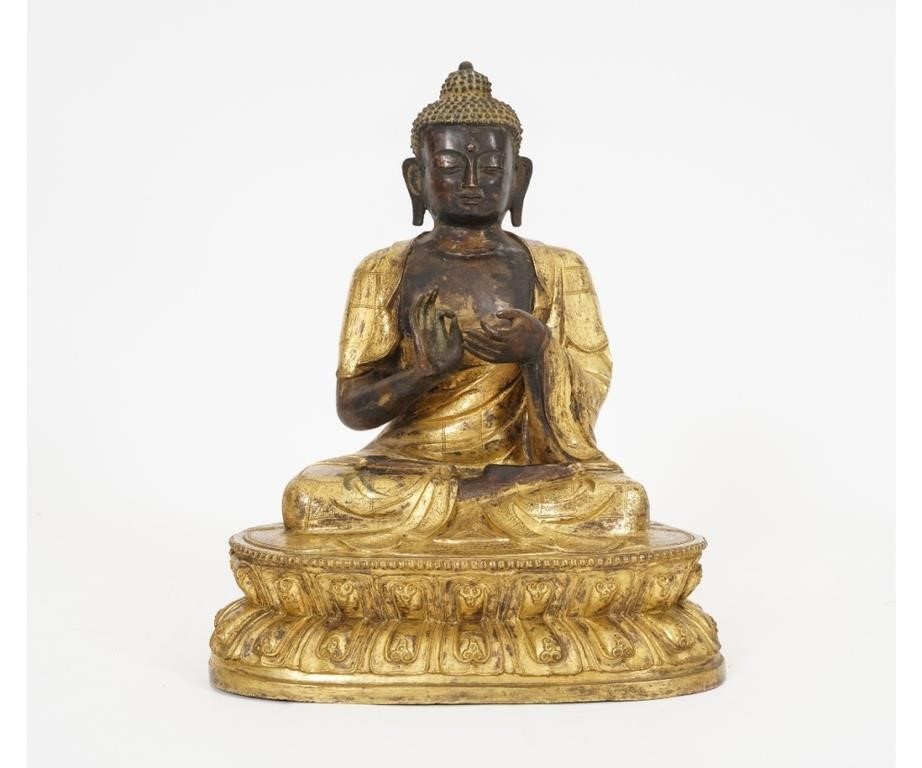 Appraisal: Seated bronze Buddha with gilted robe and base h x