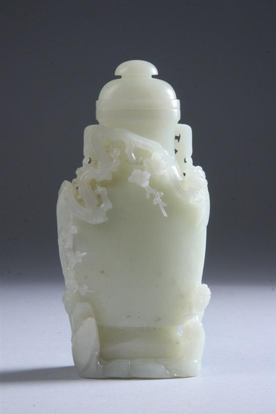 Appraisal: CHINESE LIGHT CELADON JADE VASE AND COVER Qing Dynasty Of