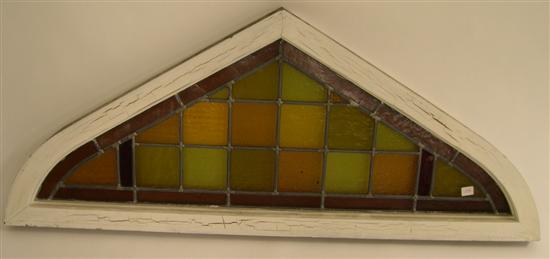 Appraisal: Window frame with triangular wooden leaded glass multicolor squares of