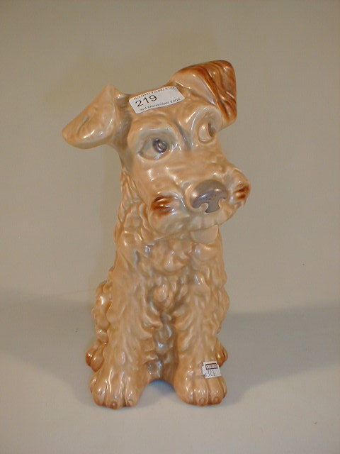 Appraisal: A Sylvac model of a seated terrier in brown glaze