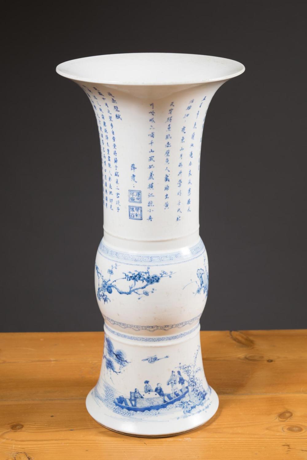 Appraisal: CHINESE BLUE AND WHITE PORCELAIN VASE of gu form hand