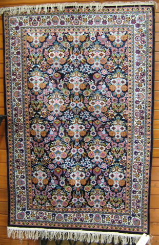 Appraisal: HAND KNOTTED ORIENTAL AREA RUG Indo-Persian overall spring floral design