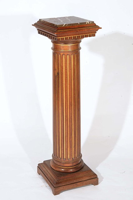 Appraisal: A VICTORIAN MAHOGANY FLUTED COLUMN with gilt decoration and inset