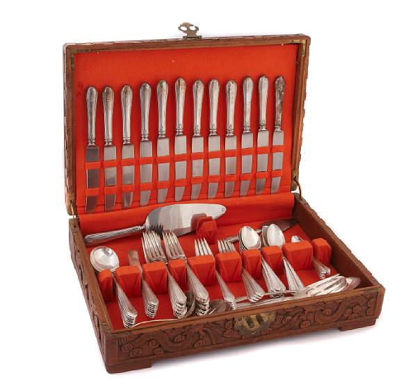 Appraisal: A sterling assembled flatware set with a wooden caseTowle Silversmiths