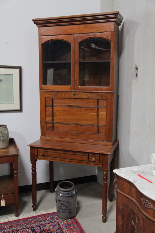 Appraisal: TWO PIECE SECRETARY BOOKCASE Walnut having a stepped cornice two