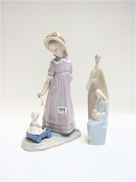 Appraisal: TWO LLADRO PORCELAIN FIGURES young girl pulling wagon with doll