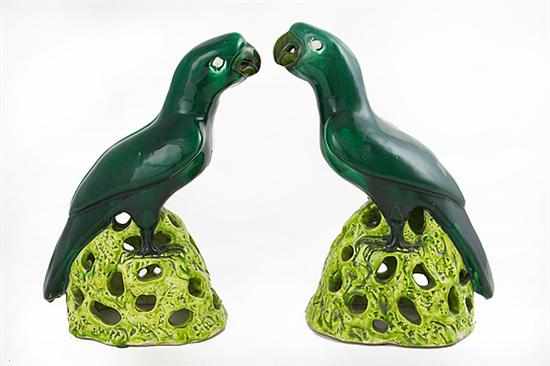 Appraisal: Pair Chinese Export porcelain parrots th century bird perched on