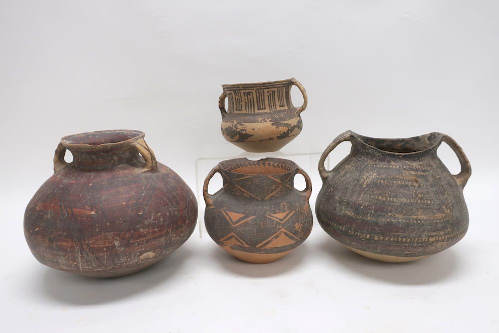 Appraisal: Four Small Chinese Neolithic Vessels Four smaller jars with high