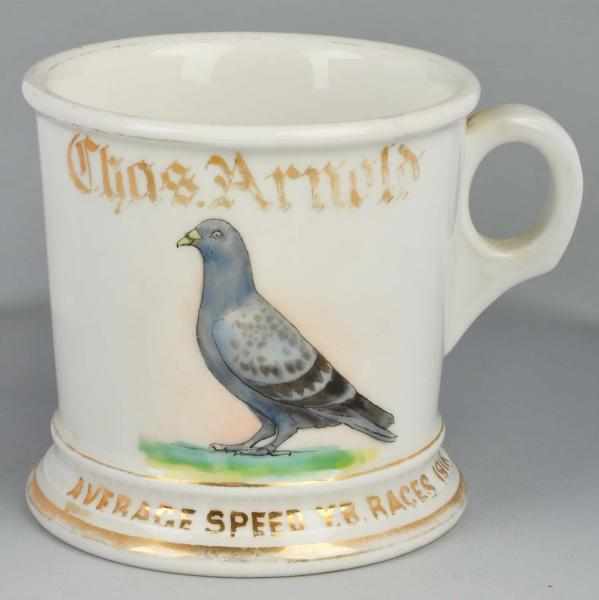 Appraisal: Piegon Shaving Mug Description Gilt name Chas Arnold Shows colorful