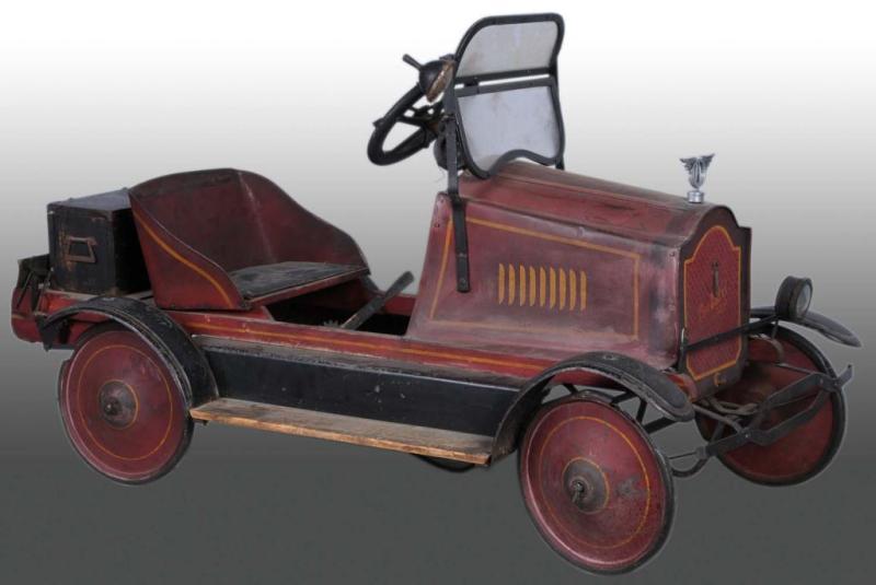 Appraisal: Pressed Steel Sidwaytopliff Packard Pedal Car Description Manufactured in Washington