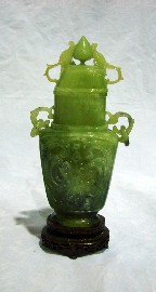 Appraisal: A Chinese twin handled vase and cover in celadon nephrite