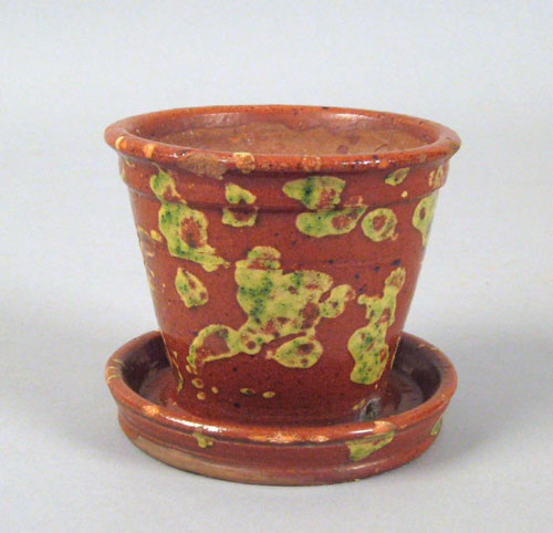 Appraisal: Pennsylvania redware flower pot th c with green slip decoration