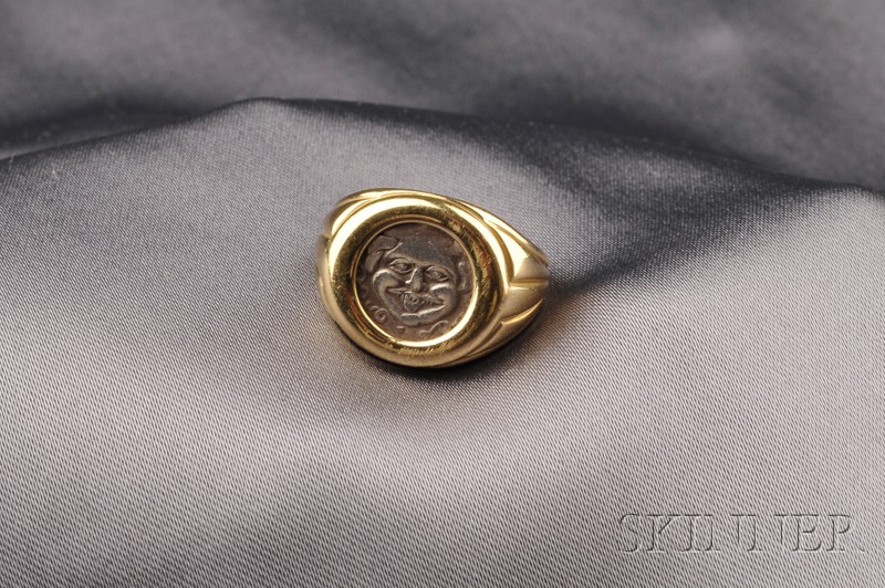 Appraisal: kt Gold and Silver Ring bezel-set with a silver disk