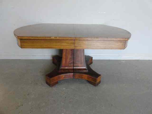 Appraisal: Mahogany Split Pedestal Dining Table withString Inlay Beautiful th century