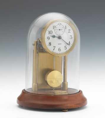 Appraisal: Barr Electromagnetic Clock in Glass Dome Brass skeleton design with