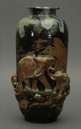 Appraisal: Chinese Glazed Pottery Vase with Relief Decoration of Elephants in