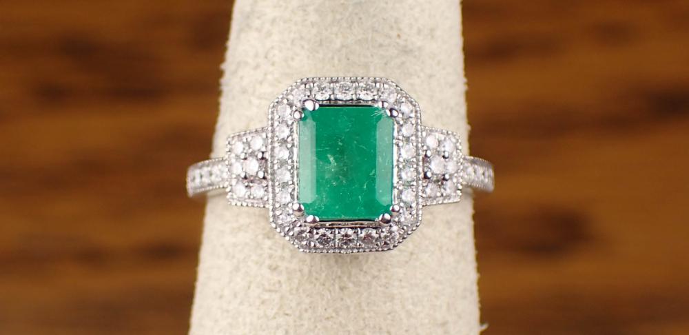 Appraisal: EMERALD DIAMOND AND FOURTEEN KARAT GOLD RING The white gold