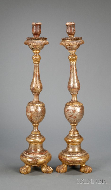 Appraisal: Pair of Giltwood Candlesticks Continental th century carved paw feet