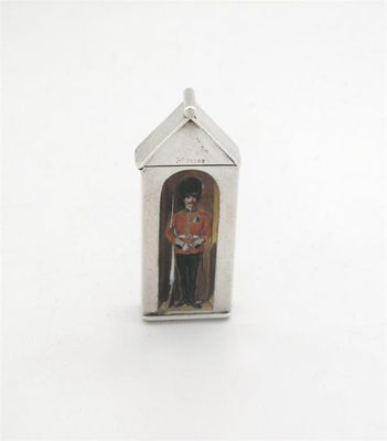 Appraisal: A Victorian 'sentry box' vesta case enamelled with a guardsman