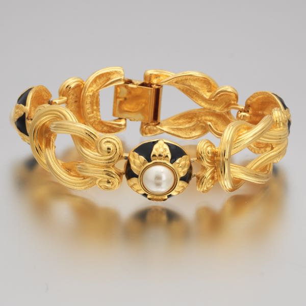 Appraisal: FENDI BRACELET L x W Gold-tone bracelet with fold-over clasp