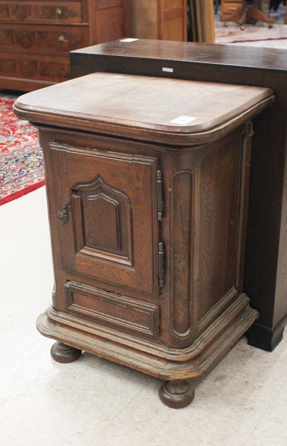 Appraisal: SMALL SINGLE-DOOR OAK SIDE CABINET Continental th century H x