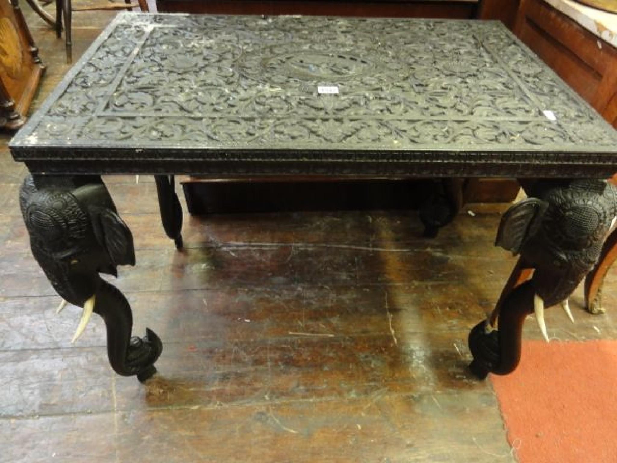 Appraisal: An Indian hardwood occasional table of rectangular form with profusely