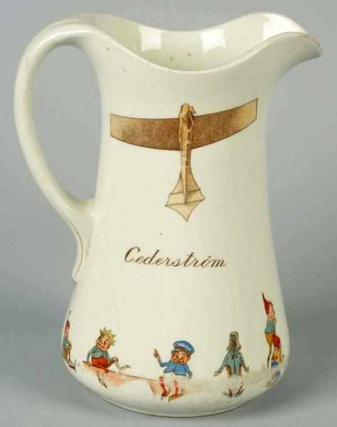 Appraisal: Porcelain Brownies Airplane Milk Pitcher Ideal Marked Cederstom Rubs over