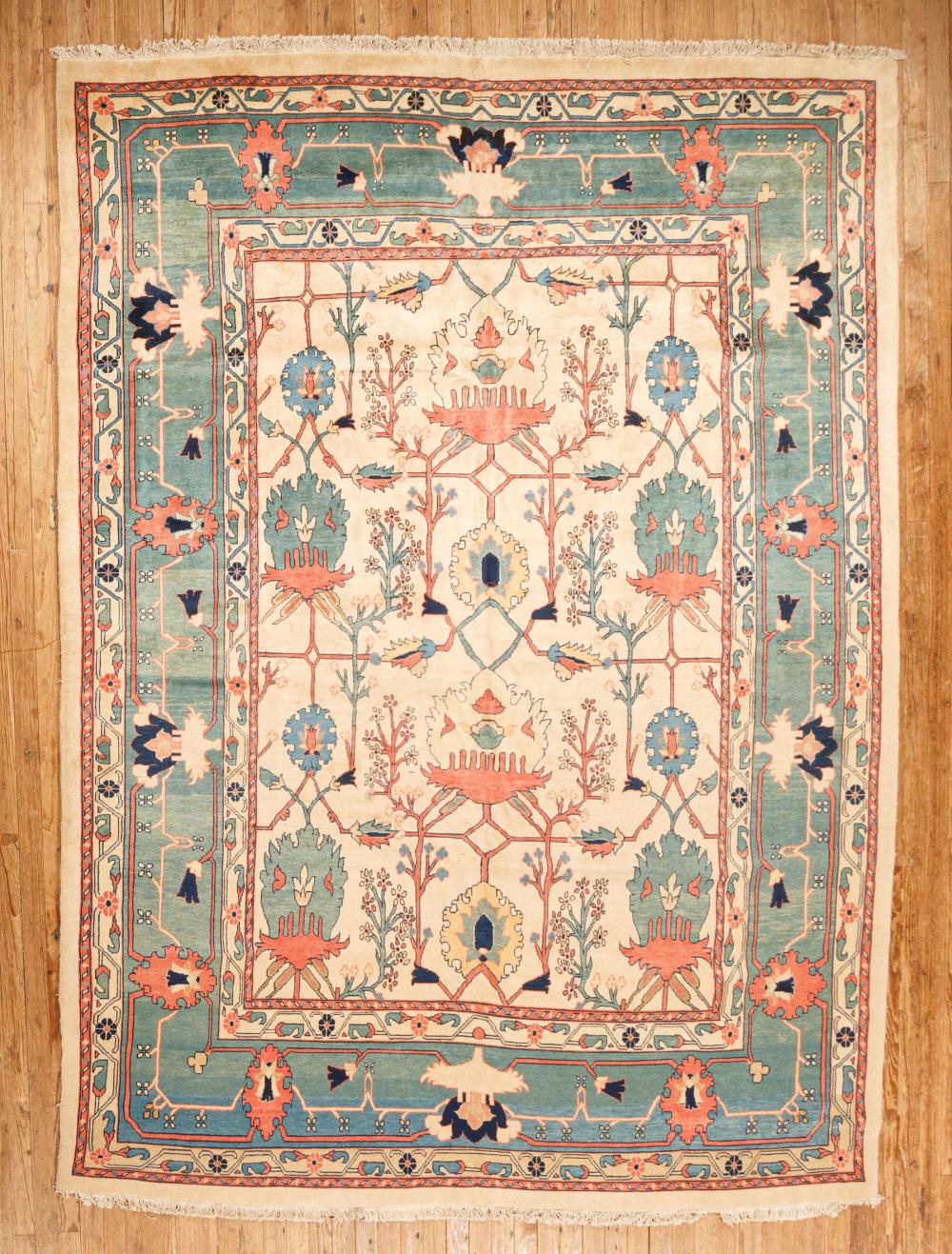 Appraisal: Persian Serapi Carpet cream and teal ground stylized floral designs