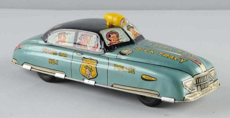 Appraisal: Tin Marx Dick Tracy Squad Car Friction Toy Description American