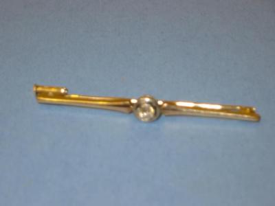 Appraisal: A DIAMOND BAR BROOCH the old brilliant cut diamond collet