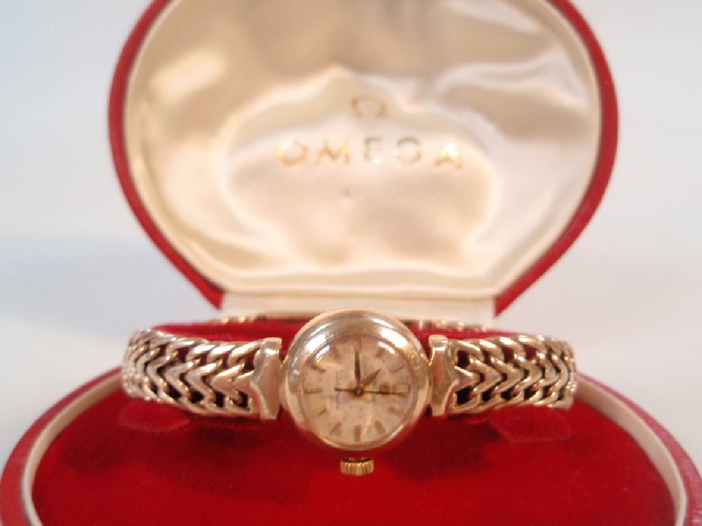 Appraisal: An Omega Ladymatic ladies wristwatch on a ct gold bracelet