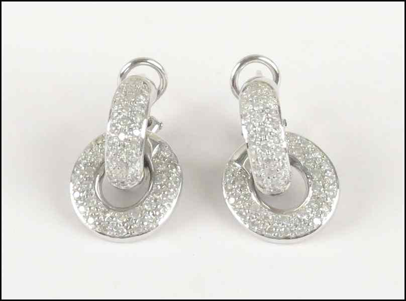 Appraisal: WHITE GOLD AND DIAMOND CLIP POST EARRINGS Diamonds are H-I-J