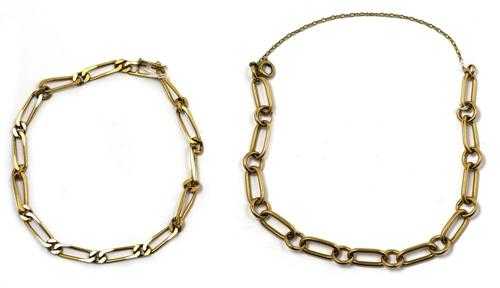 Appraisal: LOT GOLD-BRACELETS um Gelbgold g Panzer-Figarokette mit Federring-Verschluss L ca