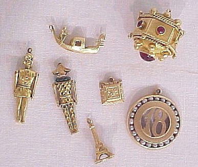 Appraisal: Jewelry K yellow gold charms including a large octagonal box