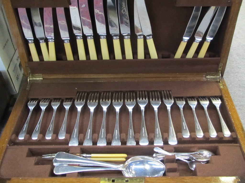 Appraisal: Walnut part canteen of cutlery piece and some fish cutlery